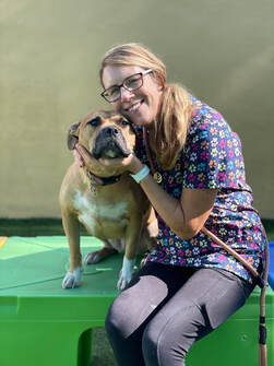 Team member with dog