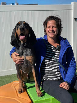 Team member with dog