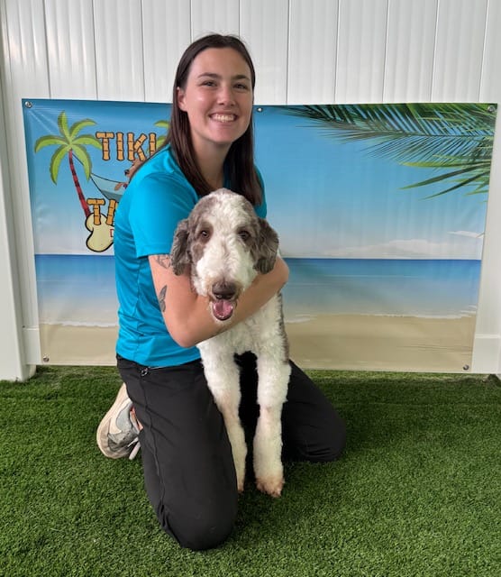 Team member with dog