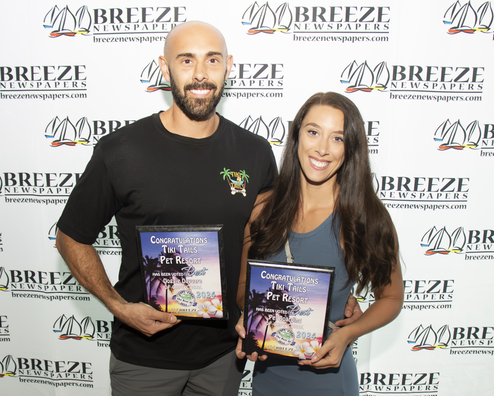 Brandon and Kayleigh, owners of Tiki Tails Dog Resort